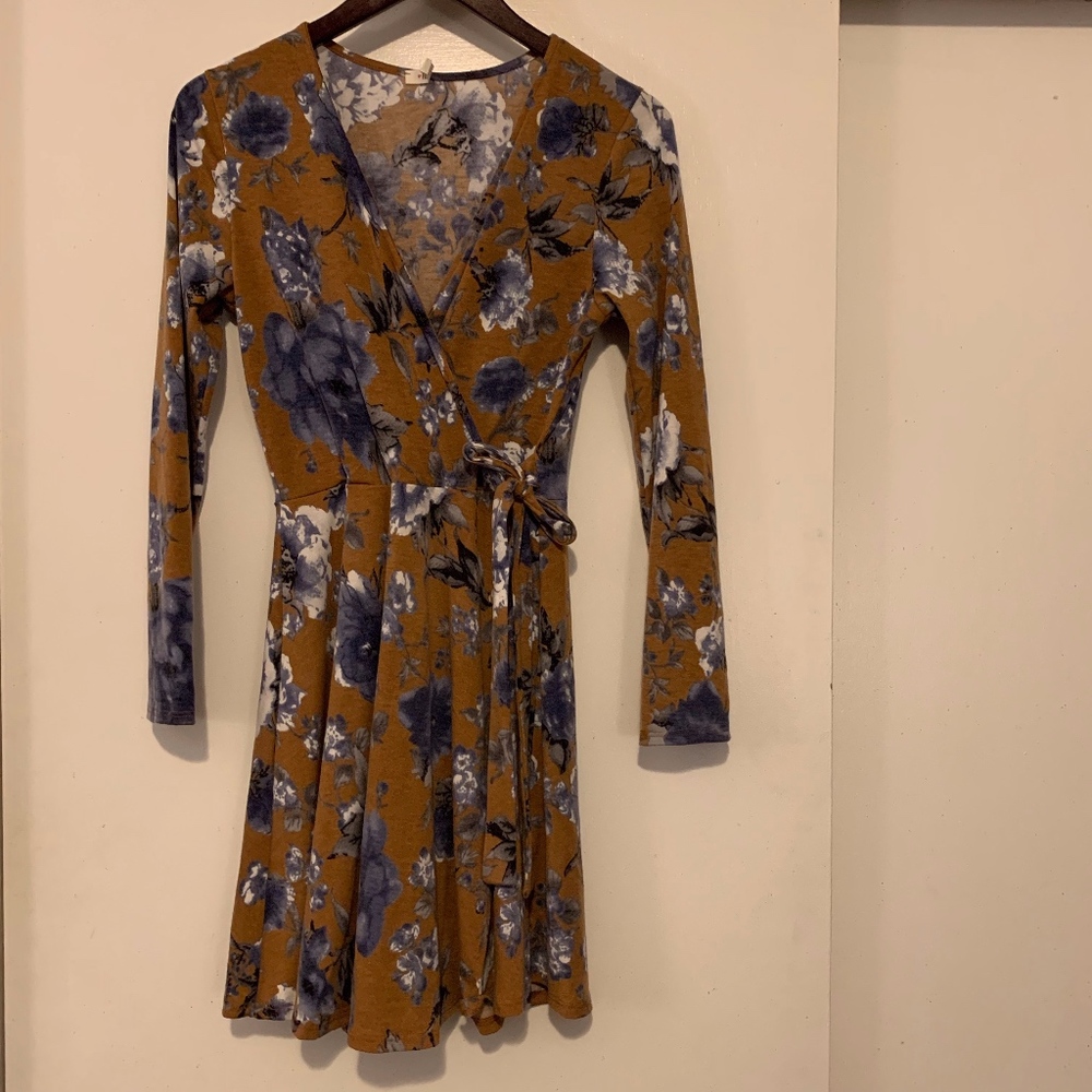 Beautiful, floral faux wrapped dress!